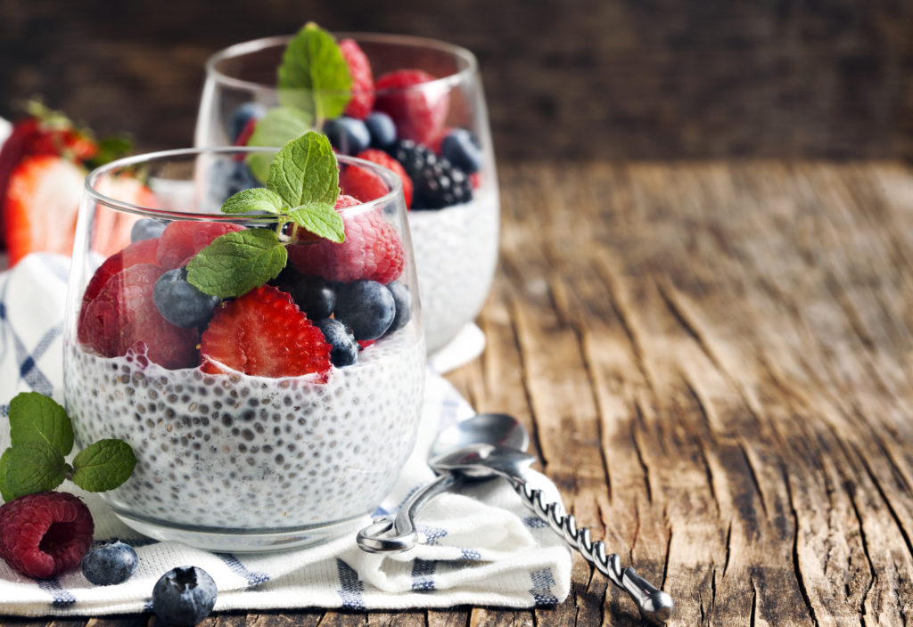 A shot of 2 Chia seed pudding with berries